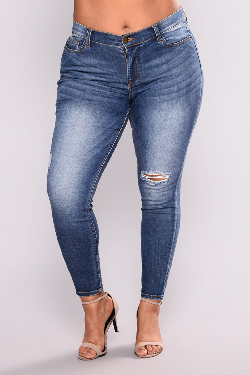 Large size hole high elastic jeans women's feet pants