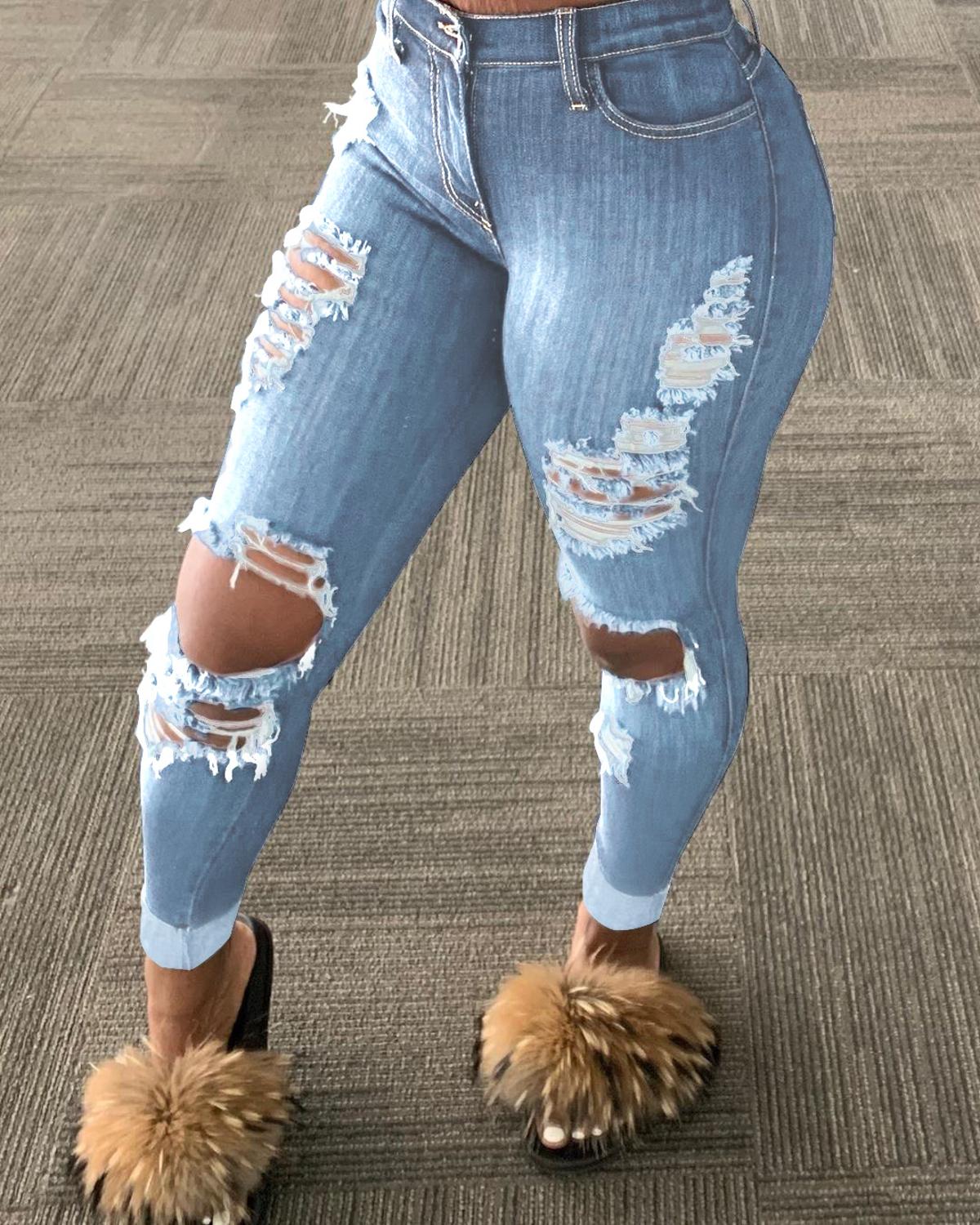 Explosion style ripped denim trousers